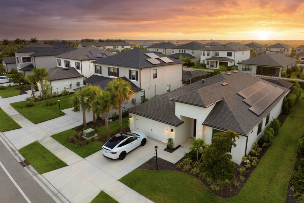 Florida homes with impact windows vs shutters at sunset