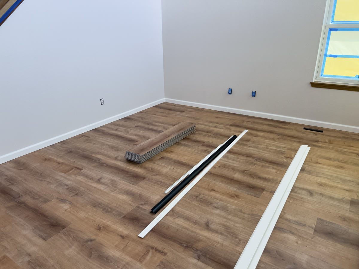LVP vs laminate flooring in a room during floor installation