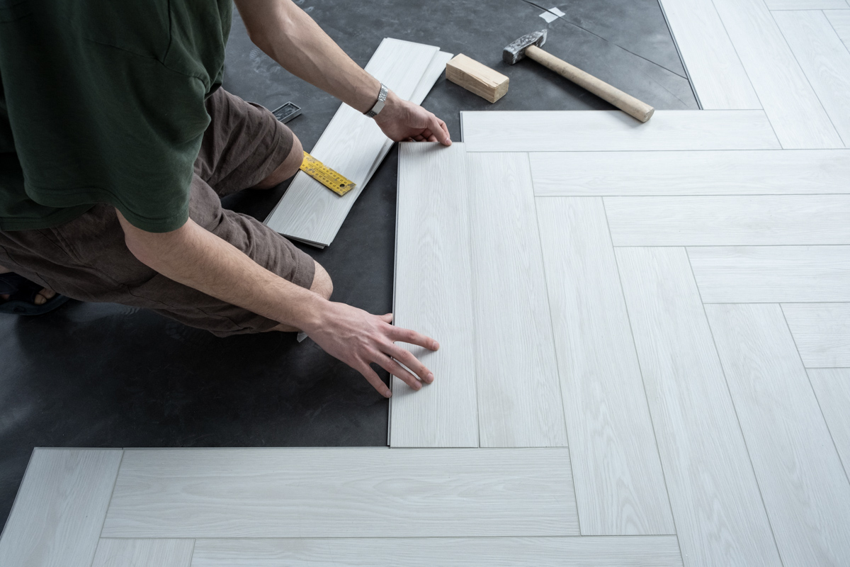 Contractor installing flooring under florida hvhz code requirements
