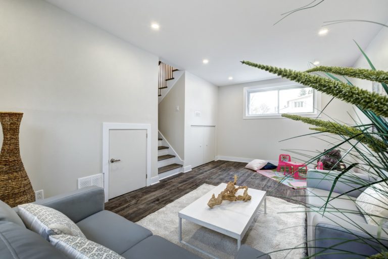 Bright renovated condo living room for condo association insurance coverage
